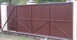Купить откатные ворота из профнастила Шарыпово, цена от 1757 руб.